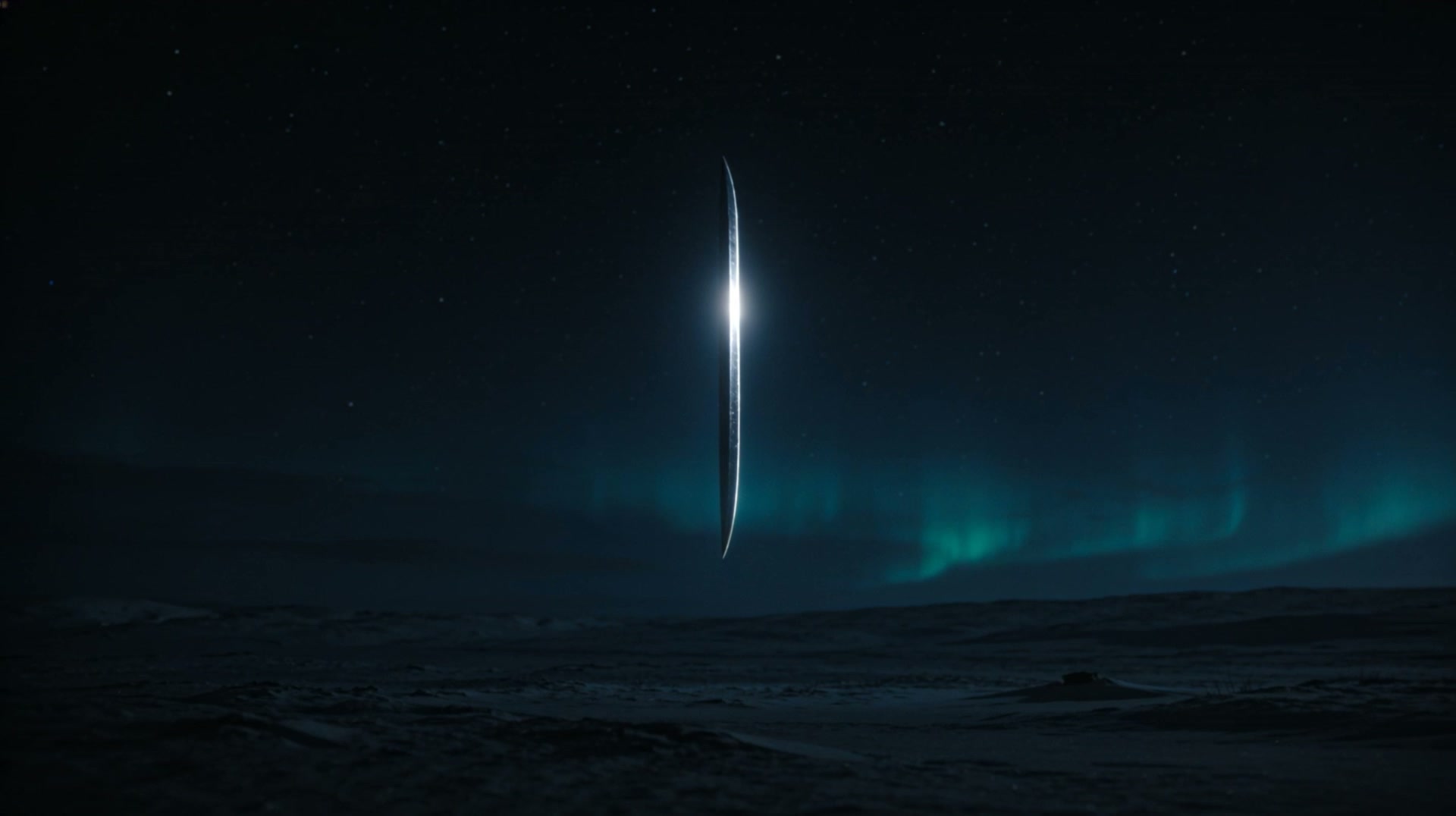 Ein stiller, präziser Lichtsaum teilt die dunkle Landschaft in einen geordneten Horizont